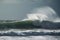 Big wave breaking on the coast of Atlantic ocean, stormy weather