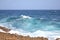 Big wave on Caribbean sea by the rocky coast of Aruba