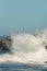 Big waves against the rocks. Santander lighthouse, Cantabria, Spain