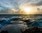 Big waves breaking and splashing on the rocks