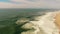 Big waves on sandy beach of the western coast of Portugal aerial