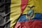 big waving national colorful flag of belgium and national flag of ecuador