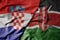 big waving national colorful flag of croatia and national flag of kenya