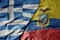 big waving national colorful flag of greece and national flag of ecuador