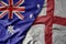 big waving realistic national colorful flag of australia and national flag of england