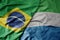 big waving realistic national colorful flag of brazil and national flag of sierra leone