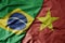 big waving realistic national colorful flag of brazil and national flag of vietnam