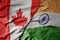 big waving realistic national colorful flag of canada and national flag of india