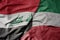 big waving realistic national colorful flag of iraq and national flag of kuwait