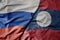 big waving realistic national colorful flag of russia and national flag of laos