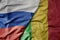 big waving realistic national colorful flag of russia and national flag of mali
