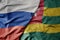 big waving realistic national colorful flag of russia and national flag of togo