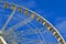 Big Wheel aka Grande Roue de Paris at Place de la Concorde on blue sky in Paris, France,