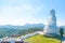 Big white bodhisattva guanyin statue with blue sky background at Wat Huai Pla Kung temple, Chiang rai,Thailand.Asian Landscape