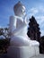 Big White Buddha Statue At The Front Of Main Yard Of Buddhist Temple