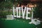 Big white love sign made of wood wedding decor