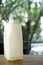 Big white plastic fresh milk bottle with gray cap