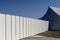 Big white tent pavilion for mass events on a background of blue sky