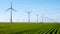 Big windmills in the Netherlands, energy transition in the Netherlands with green agriculture field