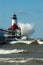 Big WOOSH! wave and michigan lighthouse