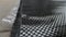 Big woven Black carbon fiber composite material background close up view