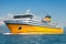 Big yellow passenger ferry goes on the Sea