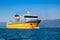 Big yellow passenger ferry on the Mediterranean Sea