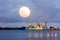 Biggest supermoon in 18 Years of March 19, 2011 shines over the lights of Crystals Mosque, Malaysia.