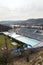 Biggest swimming complex with indoor and outdoor pools, toboggan water slide and diving towers with Vltava river in background