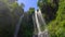 The biggest waterfall on the Bali island-the Sekumpul waterfall. Slowmotion shot. Travel to Bali concept