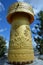 Biggest in the world golden tibetian prayer wheel in Shangri-la