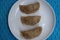 Bihari Dal Pitha, Pithas, popular rice flour dumplings made with rice flour dumplings filed with spicy filling of Dal, traditional