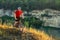 Bike adventure travel photo. Cyclist on the Beautiful Meadow Trail on sunny day.