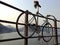 Bike against the backdrop of the mountains and river at dawn