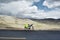 Bike on the asphalt and with pasture landscape