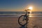 Bike on a Beach at Sunset