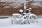 Bike covered with snow