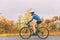 Bike cyclist outdoor woman biking road bicycle in autumn foliage nature