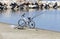 The bike and fishing rod on the beach