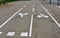 Bike lanes or cycle paths in opposite directions along the car road in the city of Belfort in France.