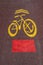 Bike lanes yellow sign anchor red background