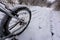 Bike off the trail buried in snow in winter scenery