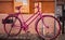 Bike painted with pink left on the street
