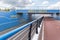 Bike path and car road under blue traffic tunnel