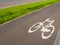 Bike path with painted bicycle sign