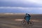 Bike racer in storm desert