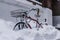 Bike rack covered in snow