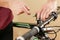 Bike repair. Bicycle fixing. Hex wrench works. Man configures th