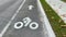 Bike riding symbols on roadway
