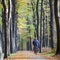 Bike on road in autumnal forset on utrechtse heuvelrug in holland